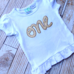 Adorable one year old appliqué and embroidery design in 6 styles and sizes – the word one in cursive