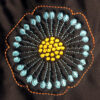 funky flower embroidery design on swimsuit