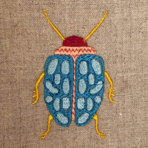 Funky beetle embroidery design