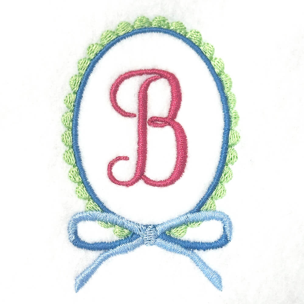 Scalloped Oval with Bow Frame Embroidery Design