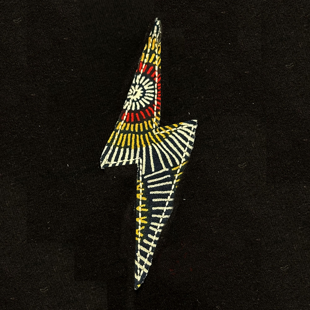 Raw edge lightning bolt applique design