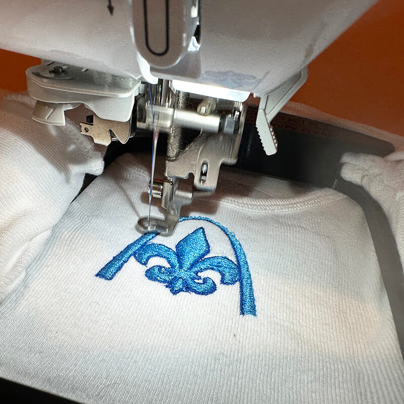 Begin stitching out your embroidery design